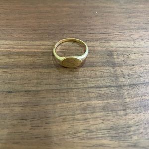 Mejuri 14k signet ring with ‘S’ engraving.